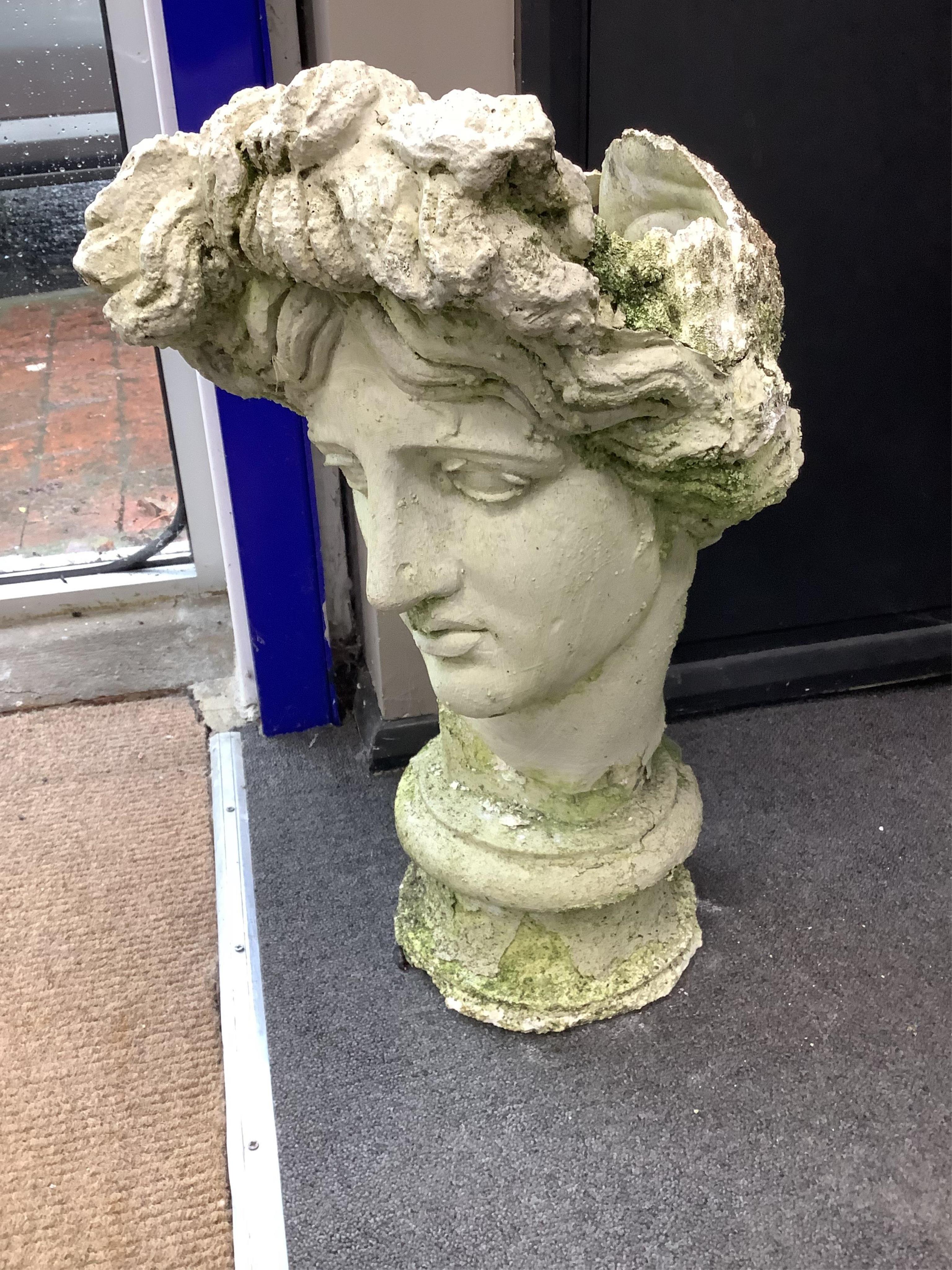 A weathered composition classical head garden urn, height 55cm. Condition - poor